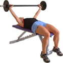 can be performed with either flat or inclined bench